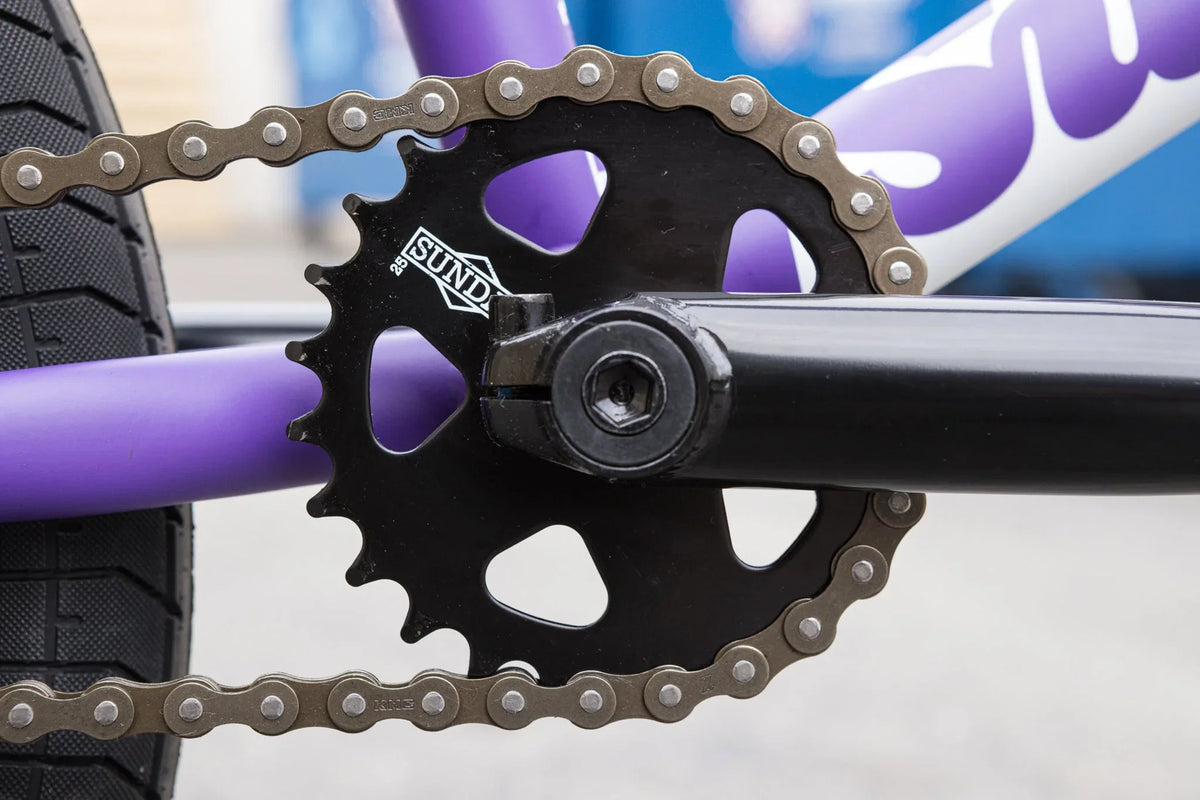 Matte Grape Soda Sunday Forecaster BMX bike featuring a black sprocket, chromoly frame, and durable chain.
