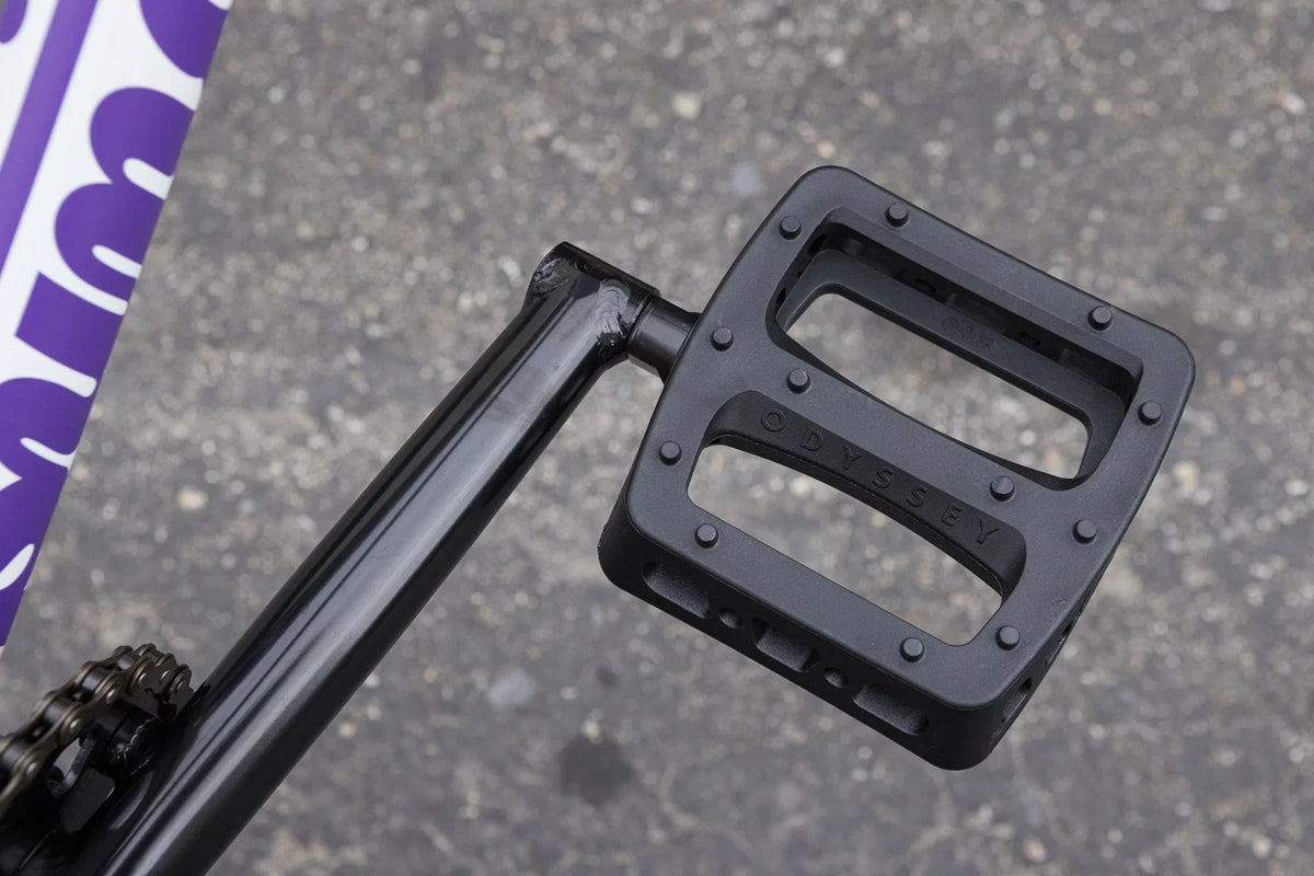 Black Odyssey Twisted Pro pedal attached to a chromoly crank arm on a Sunday Forecaster BMX bike.