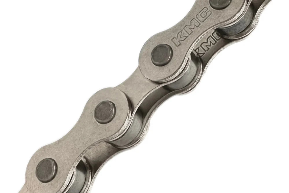 Silver KMC S1 single speed BMX chain with 1/2"x1/8" links and embossed branding on a white background.