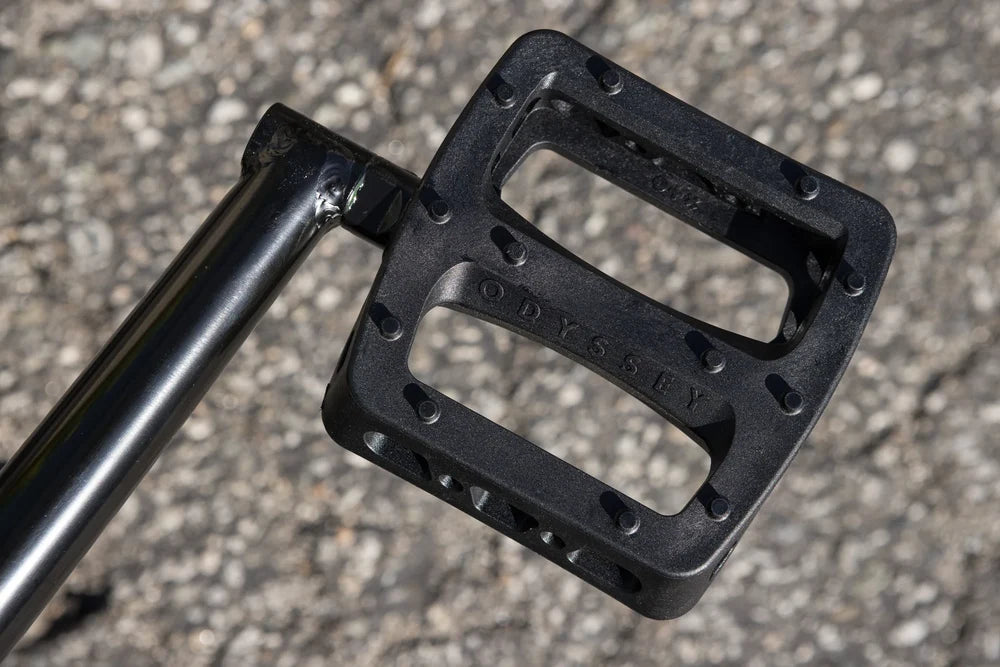 Black Odyssey Twisted Pro BMX pedal attached to a crank arm on a Sunday Scout bike.