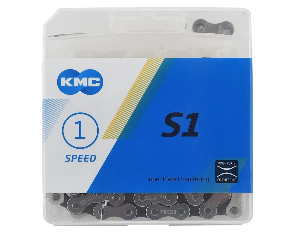 KMC S1 single-speed BMX chain in a clear plastic retail box with silver and brown links and 112 links total.