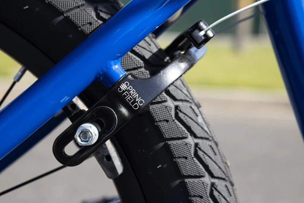 Gloss Sunday Blue BMX frame with black Odyssey Springfield U-brake and textured Current v1 tire.