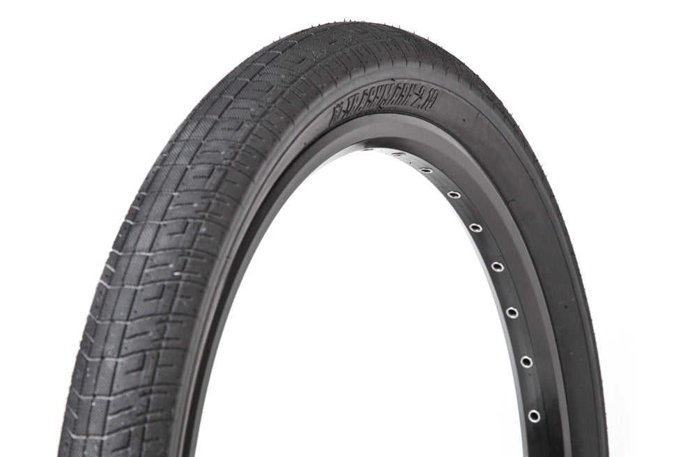 S&M Trackmark folding BMX race tire, 20 x 2.10, front view on a rim
