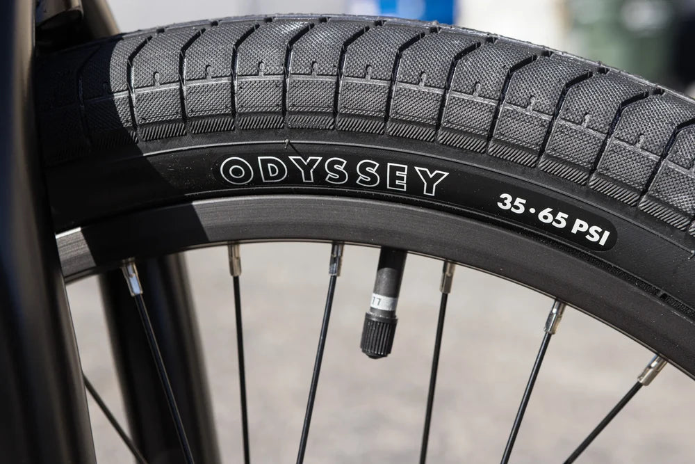 Odyssey Path Pro tire with tread detail on a black rim for the Sunday Scout BMX bike.