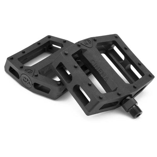 Black Cinema CK signature nylon fiberglass BMX pedals with concave design, molded pins, and knurled surface.