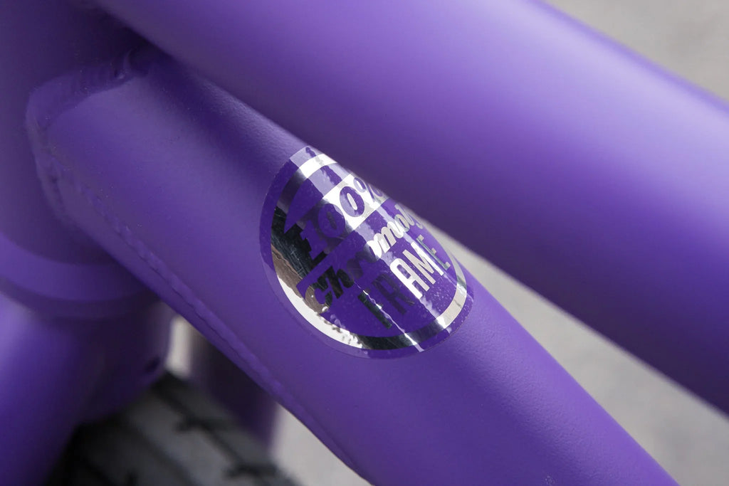 Matte grape soda purple Sunday Forecaster BMX frame with a 100% chromoly steel decal.