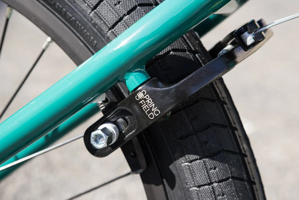 Gloss pine green Sunday Scout BMX frame with black Odyssey Springfield brake system and Path Pro tire.