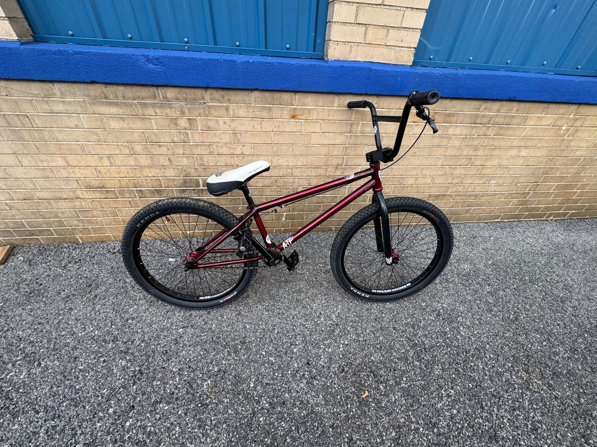 Pre-owned S&M ATF 24-inch BMX bike in trans red with black components and a white Mirra tribute seat.