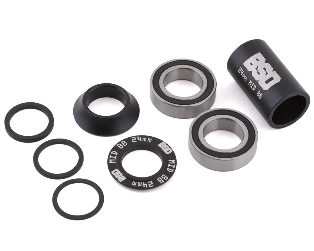 BSD 24mm Mid bottom bracket kit in black, featuring two bearings, spacers, and a branded sleeve for BMX cranks.