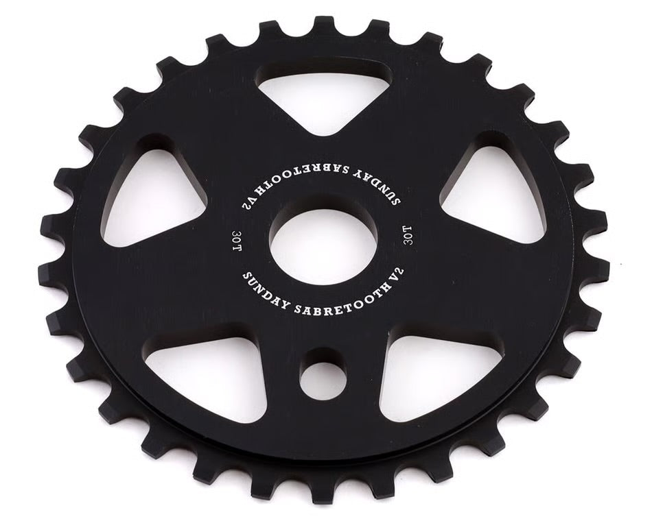 Black 30-tooth Sunday Sabretooth V2 BMX sprocket made from 6061-T6 alloy with a durable 6mm thick design.