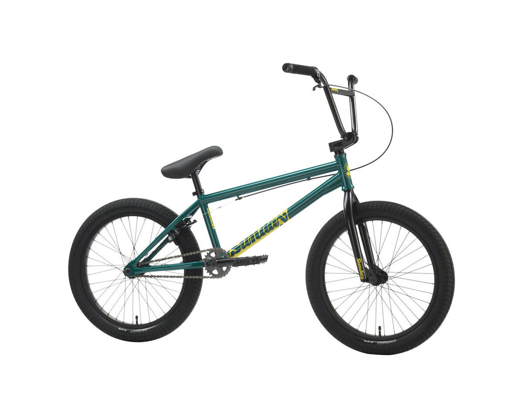 Sunday Scout BMX bike in Gloss Pine Green with 20.75-inch top tube, black components, and yellow branding accents.