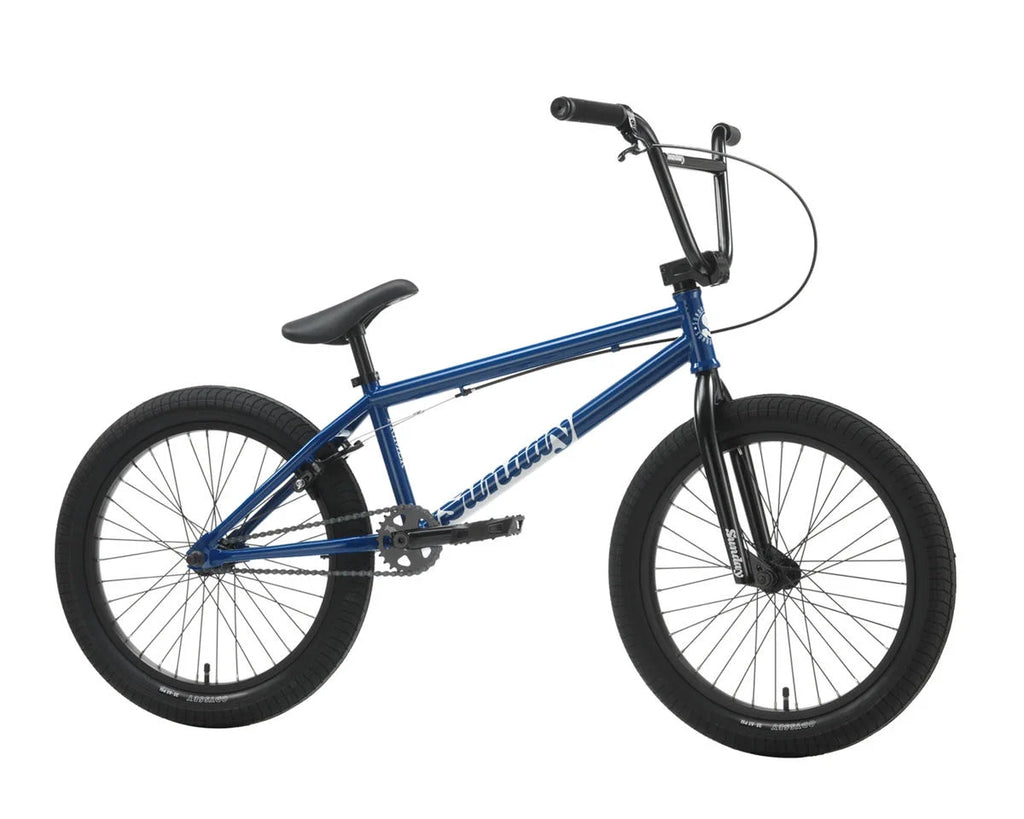Sunday Blueprint BMX bike in gloss Sunday blue with 20-inch top tube, black components, and thick tread tires.