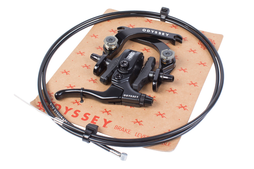 Black Odyssey Evo 2.5 BMX brake kit with aluminum brake arms, lever, and linear cable on branded packaging.