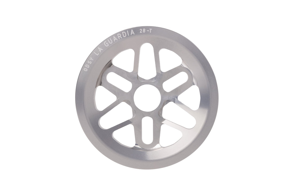 Odyssey La Guardia BMX sprocket in silver with integrated full chain guard, front view