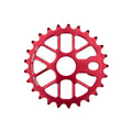 Red 25T Mission Nexus BMX sprocket made from lightweight 6061 aluminum with a webbed spoke design.